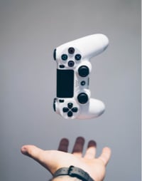 Gaming Joystick caught by a hand image